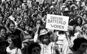 large group of women in the 1970s during a protest march